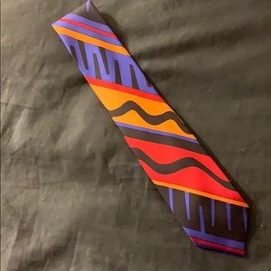 One multi-colored hand made silk tie